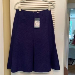Cabi skirt, vintage 2015, new with tags never worn. Navy texture fabric,